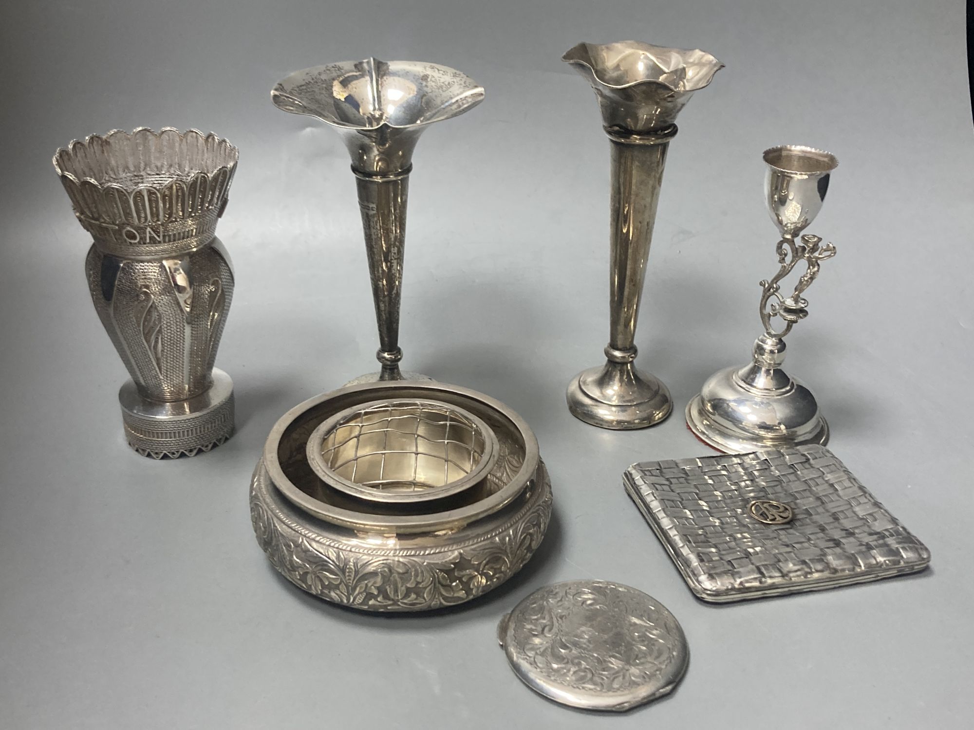 Two silver trumpet vases, one a.f., a Birks sterling compact and four continental white metal items,